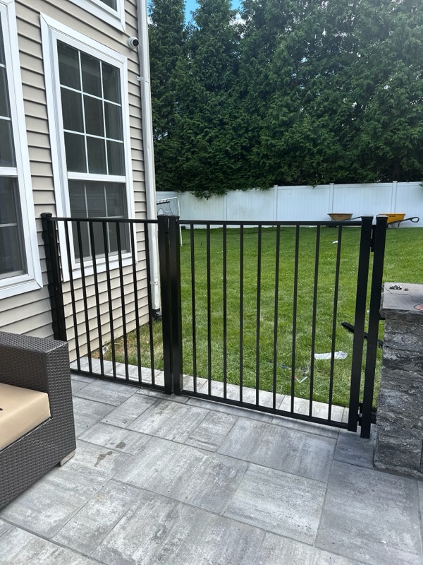Pool gate with paver patio