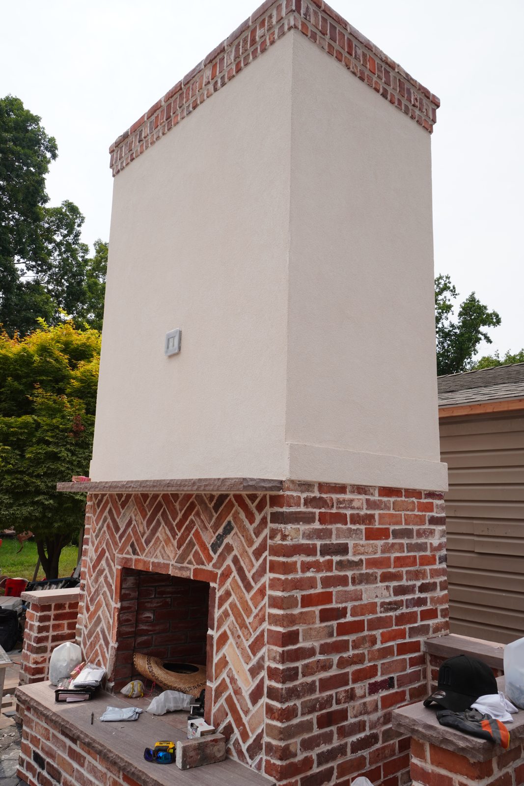Herringbone brick crown detail on custom outdoor chimney